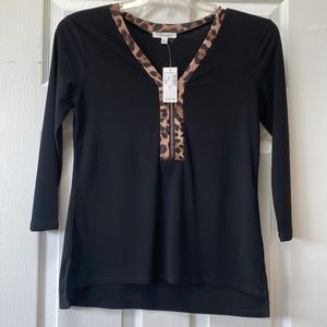 Women’s black blouse with animal print trim